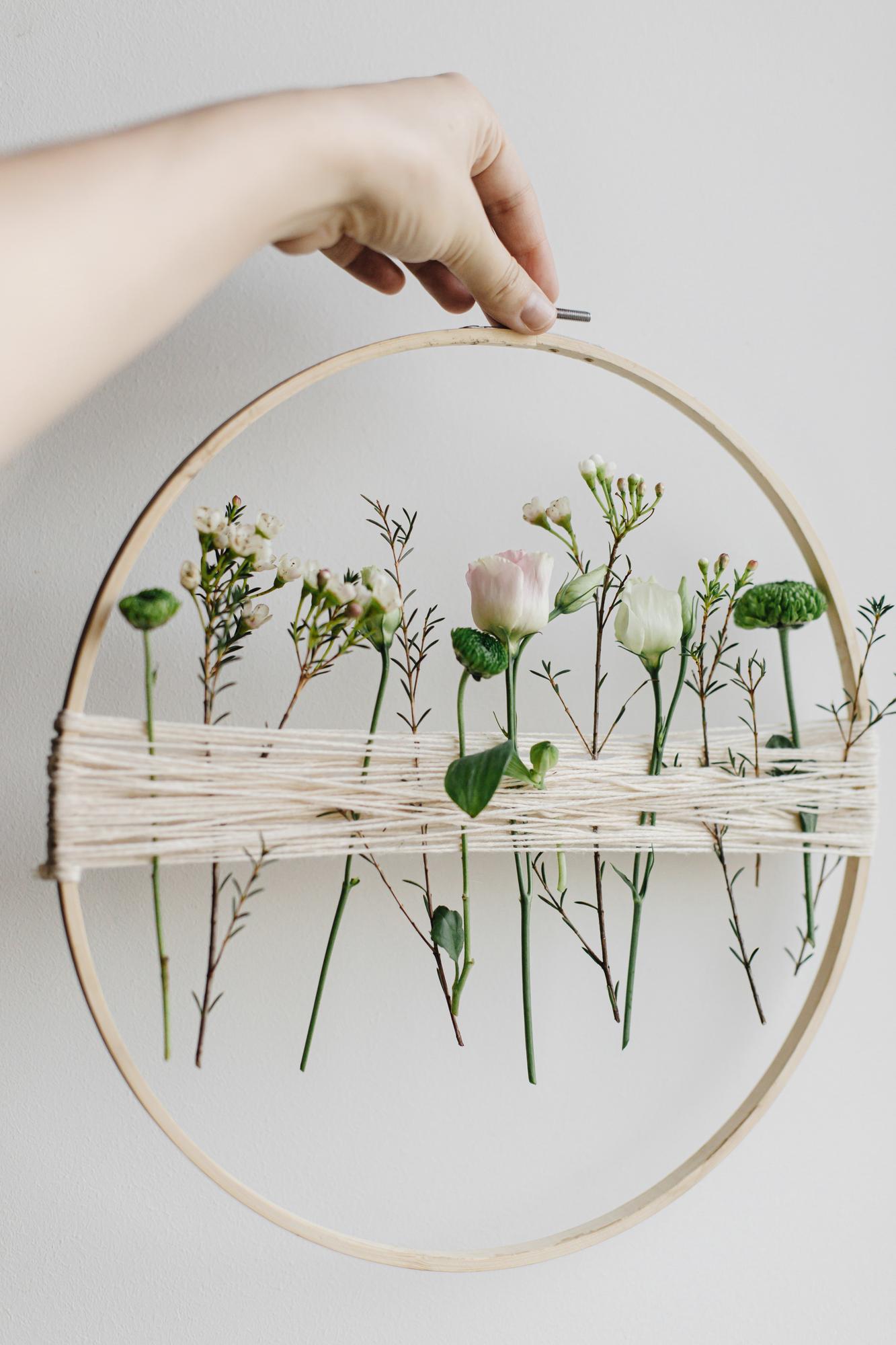 Close-up of hand embroidery hoop with floral pattern